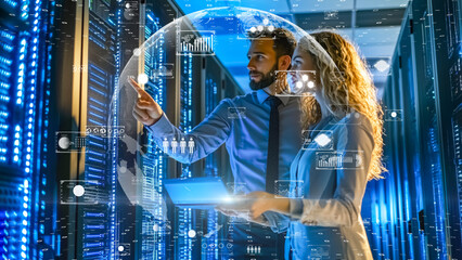 Data analysts working in server farm, advanced data technology