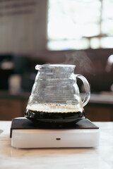 A jug of cold drip coffee at coffee shop.