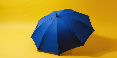 royal blue umbrella on yellow background