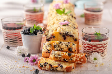 Homemade and sweet blueberries yeast cake as summer dessert.