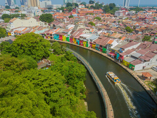 Aerial drone view of historical Malacca City with a river at Melaka, Malaysia.