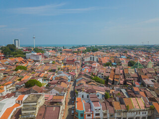 Aerial drone view of historical Malacca City with many buildings at Melaka, Malaysia.