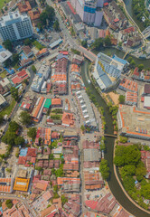 Aerial drone view of big and dense Malacca City with Malaysian settlements at Melaka, Malaysia.