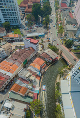 Aerial drone view of historical Malacca City with many buildings at Melaka, Malaysia.