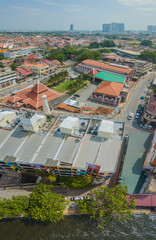 Aerial drone view of historical Malacca City with many buildings at Melaka, Malaysia.
