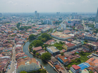 Aerial drone view of historical Malacca City with many buildings at Melaka, Malaysia.