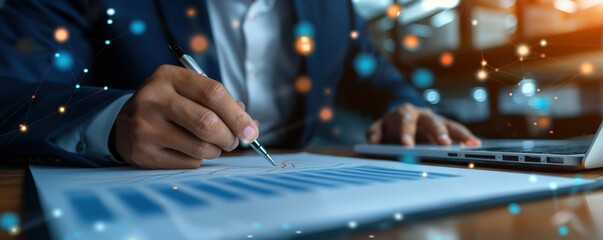 Business person working with digital graphs and charts in a modern, tech-driven office.