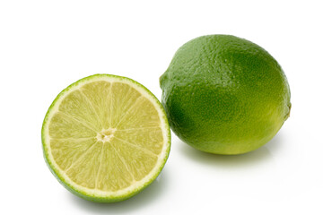 Lime and slice of lime isolated on white background