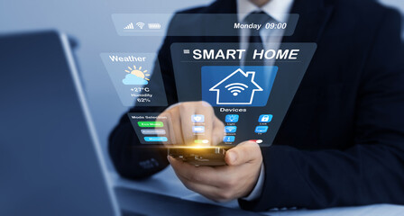 Technology assistant for smart devices,intelligent house or smart home technology.Business person using digital dashboard of smart home app for control home appliances.

