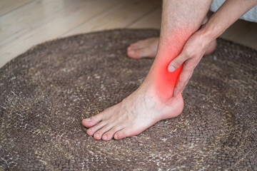 Achilles tendon injury, joint inflammation, foot pain, man suffering from feet ache, podiatry...
