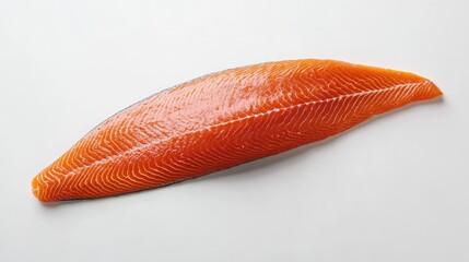 Flat lay of a fresh red salmon fillet slice on a white backdrop, showcasing its vibrant color and detail, ideal for culinary or health-related content