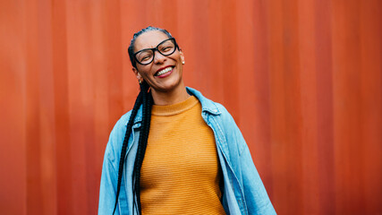 Smiling mature woman in colorful outfit, happy and confident