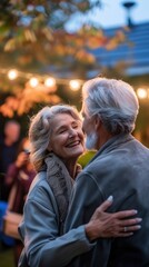 Fototapeta premium An elderly couple shares a joyful dance under twinkling lights during a warm evening gathering