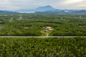 Aerial view road and the mountains as background 