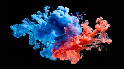 Fototapeta premium Blue and orange ink clouds dynamically mix in water against a black background, generating a vibrant, visually appealing fluid motion effect.