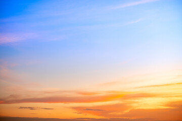 Beautiful , luxury soft gradient orange gold clouds and sunlight on the blue sky perfect for the background, take in everning,Twilight, Large size, high definition landscape photo