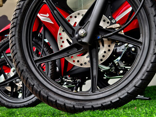 Detailed view of a motorcycle wheels and brakes