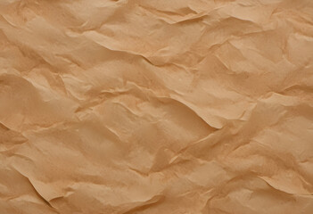 Obraz premium A textured background featuring crumpled, wrinkled paper in warm beige tones. The surface has a natural, organic feel, ideal for artistic or design purposes.