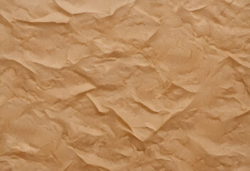 Obraz premium A textured background featuring crumpled, wrinkled paper in warm beige tones. The surface has a natural, organic feel, ideal for artistic or design purposes.