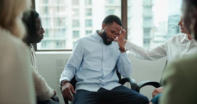 Sad man, therapist or support in group therapy for sympathy, rehabilitation or racial harassment abuse victim. Empathy, life story or people in meeting for mental health, grief counseling or talking