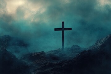Cross seen on a hill surrounded by fog 