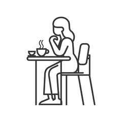 Woman Sitting at a Table with a Cup of Coffee