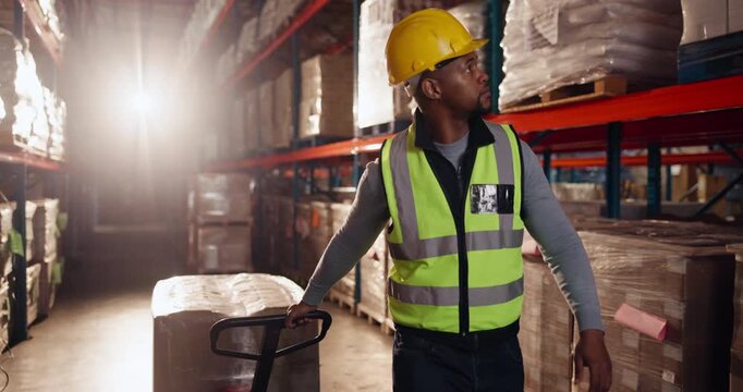 Pallet trolley, man and boxes in warehouse, logistics and shipping with inventory, storage and organized. Person, safety and employee in factory, industry and packaging with manufacturing and walking