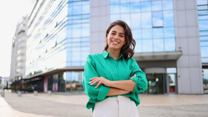 Portrait of a cheerful woman enjoying a city break