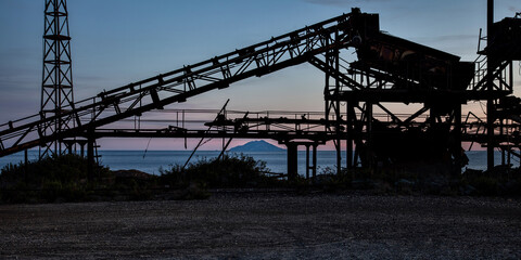 rusty machinery of the abandoned iron mine