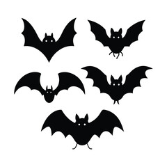 Fototapeta premium A black t-shirt featuring a festive Halloween design, showcasing a grinning jack-o'-lantern with a skull face