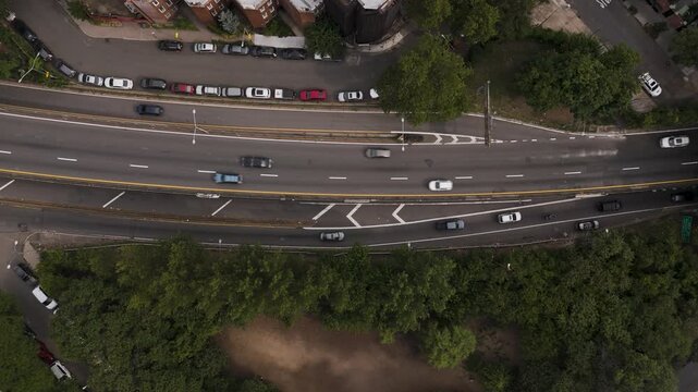 Top down aerial view of BQE car traffic during the cloudy summer day