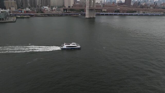 Public ferry pulling into the station in Dumbo