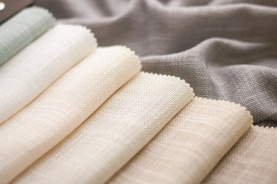 Fabric in milk, beige and gray colors for home textiles and curtains