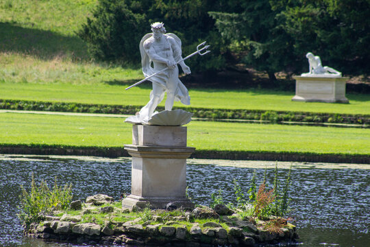 Studley Royal Water Garden Moon Pond with Neptune sculpture on the River Skell at Fountains Abbey, Ripon, North Yorkshire, England
