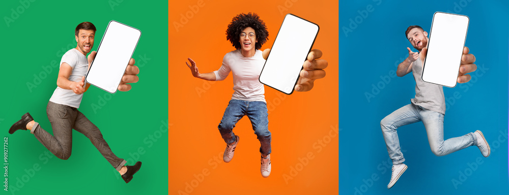 Poster cool mobile offer. excited jumping guys demonstrating smartphones with white screens on colorful bac