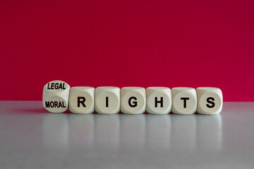 Moral or legal rights symbol. Turned a wooden cube and changes words moral rights to legal rights...