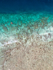 Fototapeta premium Tropical ocean water abstract texture background with sea surface, wave and beach in Indonesia