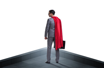 Superhero businessman on top of building