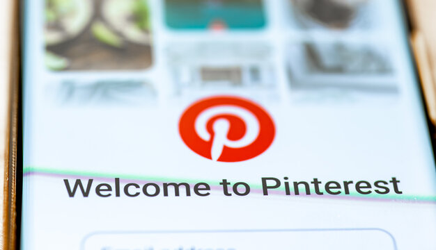 London. UK- 07.28.2024.The welcome page of the American social media app Pinterest on the screen of a mobile phone.