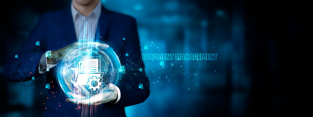 Document Management: Businessman holding innovation technology to develop smart solutions from...