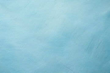 Simple, monochrome, minimalistic blue background with smooth texture reminiscent of plaster on wall, solid surface for design.