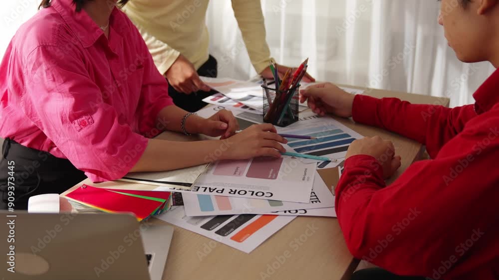 Aufkleber hand closeup of designer team brainstorming and choosing color for graphic design working or client 