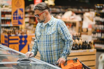 Senior man at supermarket store