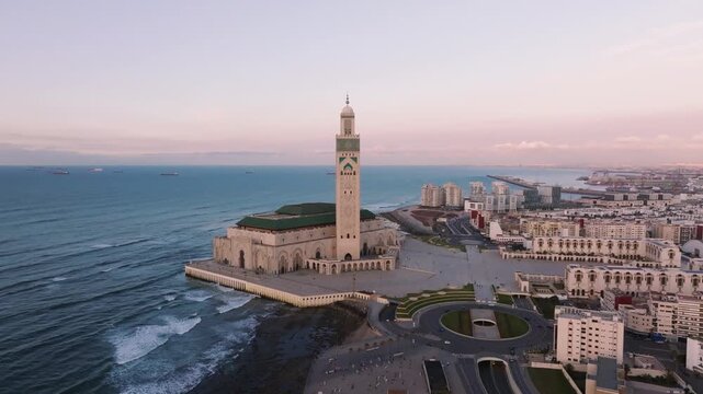 4K Aerial Pan of Hassan II Mosque in Morocco Casablanca at Sunset &ndash; Scenic Left to Right View