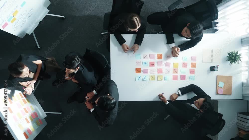 Aufkleber top down aerial view of business group sharing and brainstorming idea by using sticky notes at meeti
