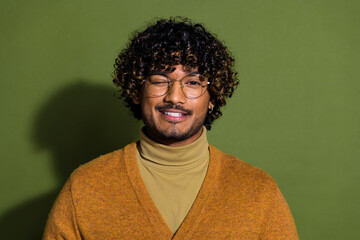 Photo portrait of attractive young man flirty wink dressed stylish brown clothes isolated on khaki...
