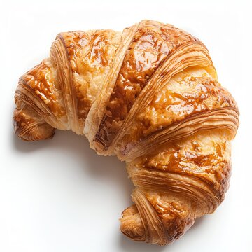 Classic French croissant with a golden hue, isolated on white, appetizing