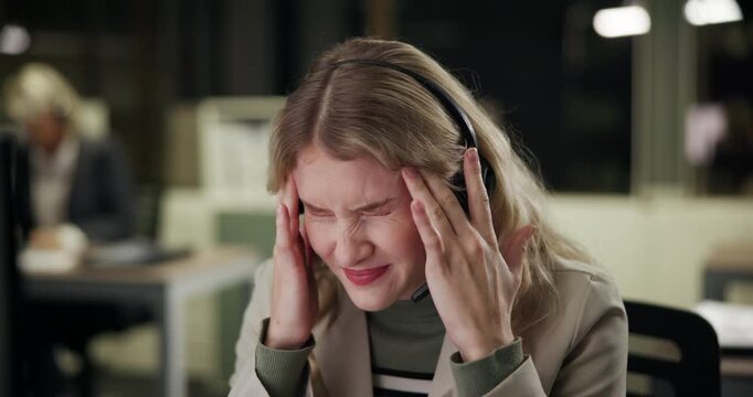 Woman, call center and tired headache at night, burnout and technical support at helpdesk. Female person, late shift and operator for customer service, tension migraine and frustrated for 404 error