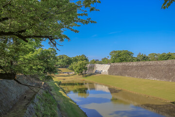 Fototapeta premium Kumamoto Castle Majestic Moat, A Striking Architectural Feat May 17 2024