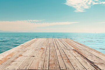 Fototapeta premium Pier. Old Wooden Pier on Sunny Day with Copy Space Over Calm Sea